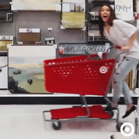 target woman riding shopping cart example of a symbolic type of brand name