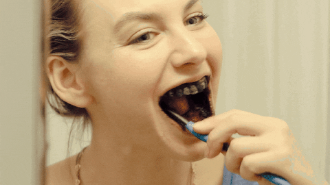 Image result for black person brushing teeth gif