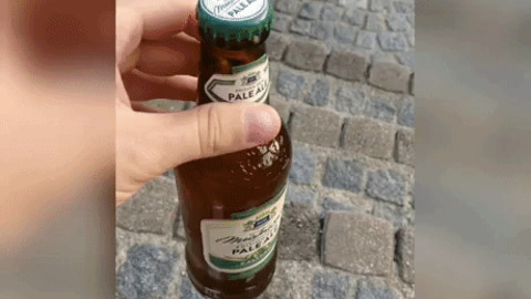 Open bottle with ring