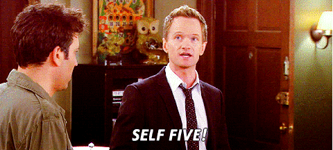 GIF of Barney from How I Met Your Mother giving himself a high five