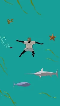 A diver sinking through blue water past fish