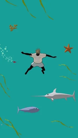 A diver sinking through blue water past fish