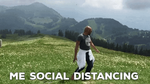 Man frolicking in the hills trying to social distance