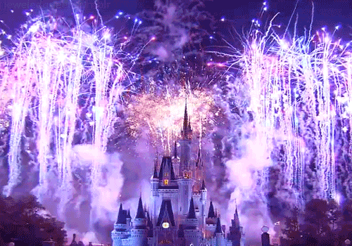 purple fireworks going off at Disney World