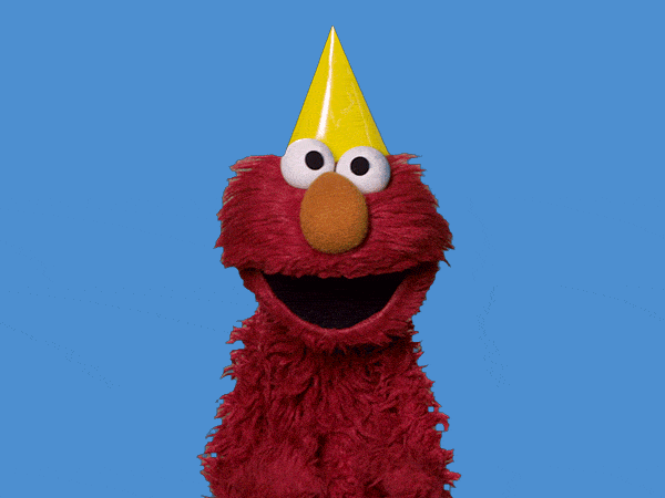 Elmo in his yellow party hat is dancing because he's happy you're going to make a great story