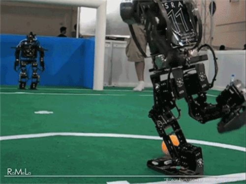 robots playing football gif