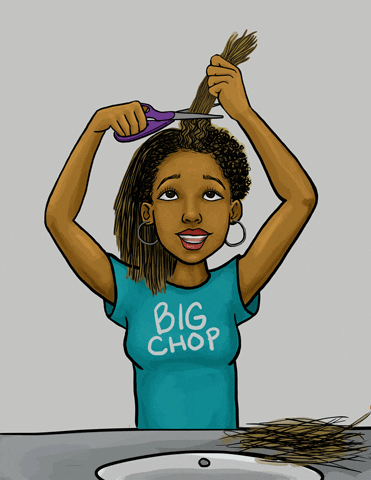 a black girl cutting her hair showing the big chop