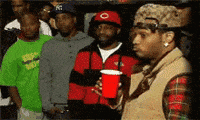 A group of men giving a long, unimpressed side-eye