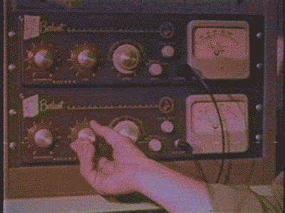 GIF of person adjusting knobs and dials