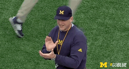 Michigan Athletics sports excited clap college football