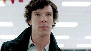 Sherlock lookig at his watch