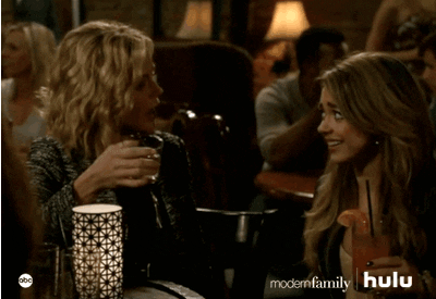 Julie Bowen and Sarah Hyland cheersing on an episode of 