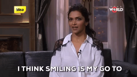 Woman saying “Smiling is my go to”