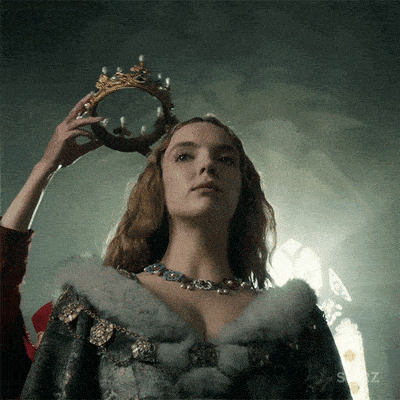 Jodie Comer, a woman with a crown on her head, crowning a queen gif at a Quinceanera event