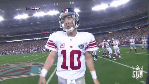 Eli Manning's Pass Under Pressure Results in Ball Bouncing Off Center,  Getting Picked Off (GIF) 