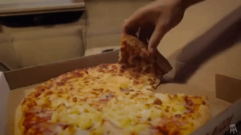 Taking pizza from a box