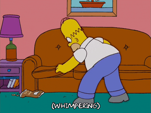 A GIF of Homer who lost something.