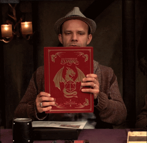 mestre de RPG abraçado com um livro de regras do Dungeons & Dragons