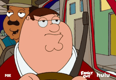 Peter from Family Guy drives his car. He is annoyed by his friends who are drinking next to him.