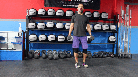 Hamstring exercises with the dumbbells