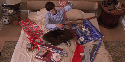 Christmas quotes, man wrapping presents