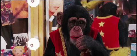 Monkey smiling with lipstick GIF