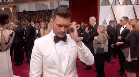 Excited Ryan Seacrest GIF