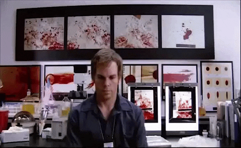 Dexter looking emotionless spinning around in an office chair looking at blood spatter. Maybe he knew the cure to the emotional flu, huh?