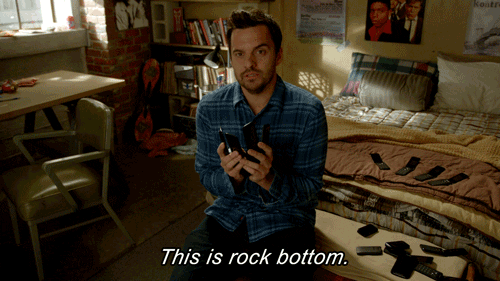 Nick Miller from New Girl, saying, "This is rock bottom."