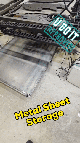 animated gif showing fabricated panel cart under plasma CNC that can be pushed under the table.