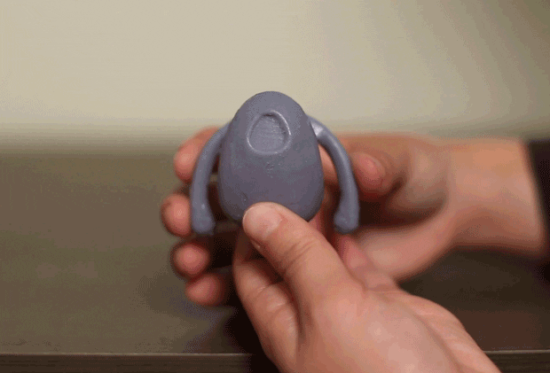 Demonstrating a sex toy for couples