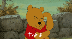 Winnie the Pooh tapping his head - 'think'