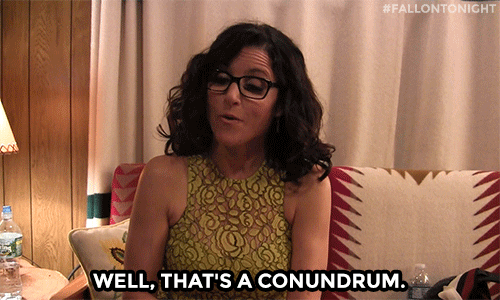 Gif of a woman saying "well, that's a conundrum."