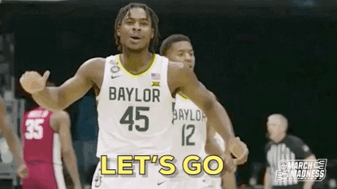 Basketball player with teammates saying "Lets Go!"