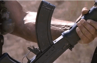 Arnold Schwarzenegger Commando GIF - Find & Share on GIPHY