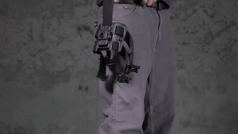 Strapping on the tactical drop thigh holster