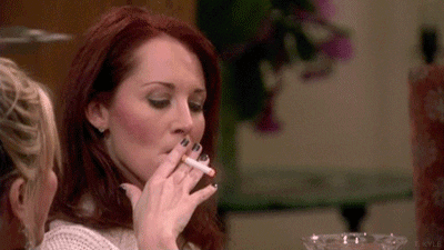 Joy Behar smoking a cigarette (or weed)
