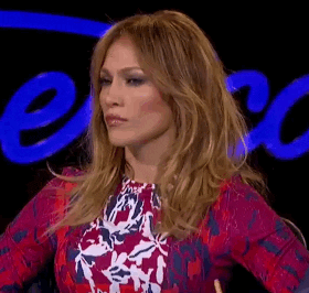 JLo with her hands on her hips