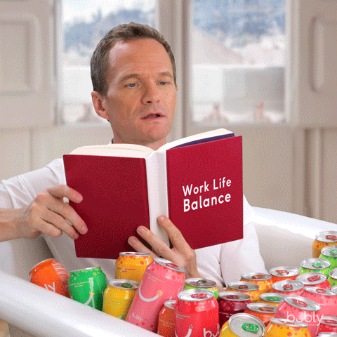 Neil Patrick Harris holding "work-life balance" book laughing about negotiating flexible work hours