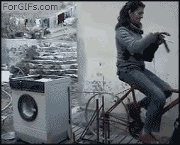 gif de uma mulher pedalando uma bicicleta para acionar a máquina de lavar