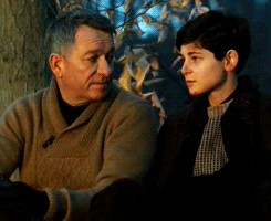 Gotham - Alfred sits with Bruce Wayne on a camping trip