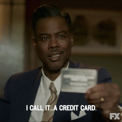 chris rock mostrando cartão de crédito