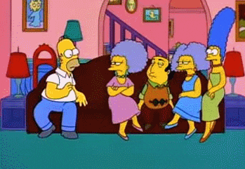 Simpsons on couch, watching a tumbleweed pass through their lounge room