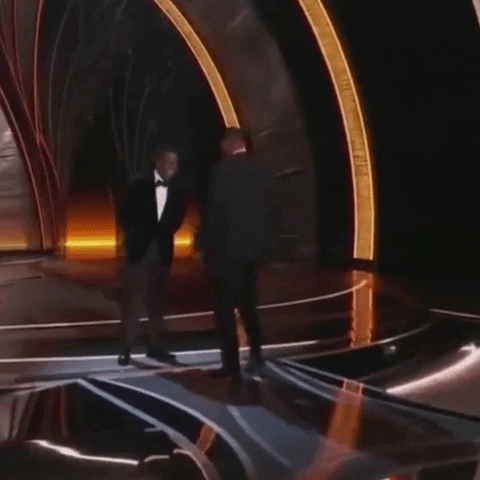 Will Smith punches a man in the face on Oscar Night in 2022