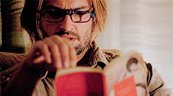 Image result for sawyer reading in Lost gif