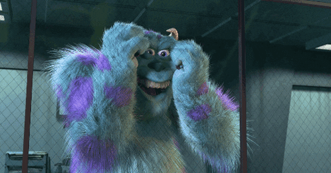 GIF of Sully (John Goodman) from Monsters Inc. dragging his hands down his face then dropping to the floor
