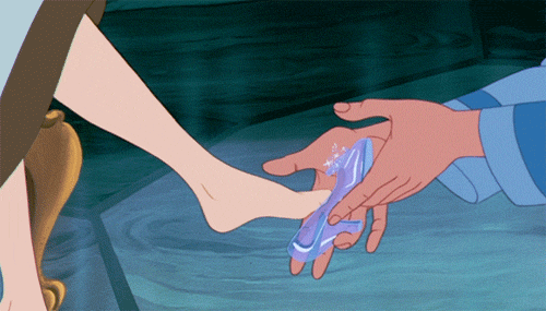 glass slipper being fitted to a foot