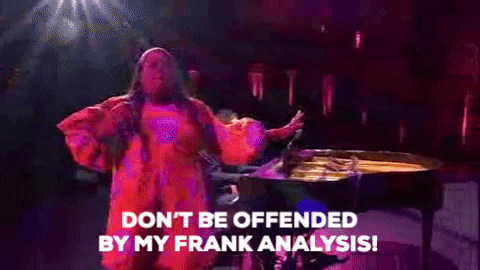 Giphy clip of woman singing "don't be offended by my frank analysis!"