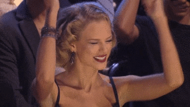 taylor swift dancing happy excited great