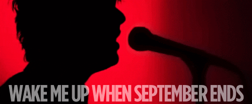 Billie Joe Armstrong, in profile, singing: Wake me up when September ends